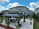 An aerial view of the backyard featuring a gazebo with comfortable seating at 3262 Hanging Tide St, Winter Garden, FL 34787