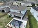 Aerial view of backyard with gazebo, patio, and well-maintained lawn at 3262 Hanging Tide St, Winter Garden, FL 34787
