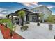 Beautiful backyard featuring a gazebo with outdoor seating and a lush garden at 3262 Hanging Tide St, Winter Garden, FL 34787