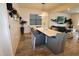 Open dining room featuring stylish lighting, contemporary table set, and seamless flow to the living area at 3262 Hanging Tide St, Winter Garden, FL 34787