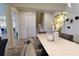 Bright dining area with modern table, elegant decor, open layout, and plank flooring at 3262 Hanging Tide St, Winter Garden, FL 34787