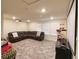 Entertainment space with projector screen and comfortable seating at 3262 Hanging Tide St, Winter Garden, FL 34787