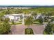An aerial view of the community's clubhouse and recreation area showcasing lush landscaping at 426 Captiva Dr, Davenport, FL 33896