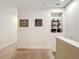 Upstairs hallway with shelving and unique decorative items at 426 Captiva Dr, Davenport, FL 33896