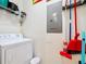 Laundry room with washer, dryer, and cleaning supplies at 426 Captiva Dr, Davenport, FL 33896