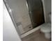 Bathroom featuring a shower and toilet with simple fixtures at 4406 Hidden Meadow Dr, Kissimmee, FL 34746