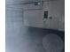 Attached garage with a garage door opener system and ample storage space at 4406 Hidden Meadow Dr, Kissimmee, FL 34746
