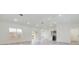 Open-concept living area with natural light highlighting the modern finishes at 4491 Sw 151 St, Ocala, FL 34473
