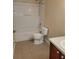 Bathroom with combined tub and shower with tile floor and modern sink at 4710 Willoughby St, Kissimmee, FL 34758