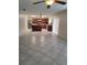 Open-concept kitchen with stainless steel appliances and tile flooring at 4710 Willoughby St, Kissimmee, FL 34758