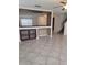 Open-concept Living Room featuring tile flooring and staircase at 4710 Willoughby St, Kissimmee, FL 34758