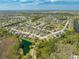 Gorgeous aerial view of homes, ponds, and landscaping in the residential community at 4740 Cypress Forest Ln, St Cloud, FL 34772