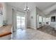 Dining area featuring tile flooring, slider doors to pool, and lots of natural light at 4740 Cypress Forest Ln, St Cloud, FL 34772