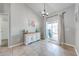 Bright dining area with tile floors, white buffet and sliding glass door at 4740 Cypress Forest Ln, St Cloud, FL 34772