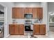 Kitchen features stainless steel appliances, stylish countertops, and plenty of storage space at 4740 Cypress Forest Ln, St Cloud, FL 34772