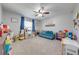 Bright and spacious playroom with a variety of toys, a comfortable couch, and a playful atmosphere for  at 4740 Cypress Forest Ln, St Cloud, FL 34772