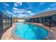 Backyard pool featuring patio, fenced in yard, and partially covered patio at 4740 Cypress Forest Ln, St Cloud, FL 34772