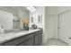 Elegant bathroom featuring granite countertops and a spacious layout at 486 Disa Dr, Davenport, FL 33837