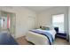 Comfortable bedroom features lots of natural light, closet space and calm decor at 486 Disa Dr, Davenport, FL 33837