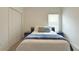 Comfortable bedroom offers lots of natural light, closet space and calm decor at 486 Disa Dr, Davenport, FL 33837