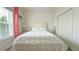 Neat bedroom with a plush bed, a window, and a closet at 486 Disa Dr, Davenport, FL 33837