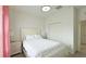 Comfortable bedroom features a cozy bed and a closet at 486 Disa Dr, Davenport, FL 33837