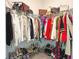 Walk-in closet with ample storage space for clothing and shoes, maximizing organization at 486 Disa Dr, Davenport, FL 33837