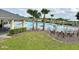 A community pool surrounded by landscaping and seating offering a relaxing outdoor space at 486 Disa Dr, Davenport, FL 33837