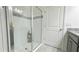 Modern bathroom shower with glass enclosure and tile accents, creating a sleek design at 486 Disa Dr, Davenport, FL 33837