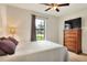 Bright bedroom featuring a ceiling fan and window at 514 Cadiz Dr, Davenport, FL 33837