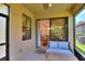 Relaxing lanai with comfortable seating and a view into the home's dining area at 514 Cadiz Dr, Davenport, FL 33837
