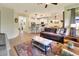 Open-concept living room seamlessly connects to the kitchen and dining area for easy entertaining at 514 Cadiz Dr, Davenport, FL 33837