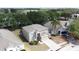 An aerial view shows a well-kept two-story house with an attached garage at 532 Kildrummy Dr, Davenport, FL 33896
