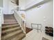 Bright foyer features soaring ceilings, a staircase, and modern tile flooring at 532 Kildrummy Dr, Davenport, FL 33896