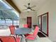 Charming covered patio featuring a ceiling fan and outdoor seating, ideal for outdoor living at 532 Kildrummy Dr, Davenport, FL 33896