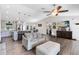 Bright open living space with a modern kitchen, comfortable seating, and a vaulted ceiling at 5801 N Kenansville Rd, St Cloud, FL 34773