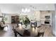 Inviting open-concept living space featuring a dining area, kitchen, and living room with great flow at 5801 N Kenansville Rd, St Cloud, FL 34773