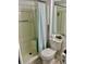 Efficient bathroom with a shower and a toilet with some decor to create an inviting atmosphere at 731 Wyman Ct # 731-A, Orlando, FL 32809