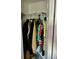 A closet filled with colorful clothes hanging on a wire shelf, with ample storage space at 731 Wyman Ct # 731-A, Orlando, FL 32809