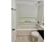Bathroom with a shower and tub combo, a white toilet, and a tiled floor, for a functional space at 731 Wyman Ct # 731-A, Orlando, FL 32809