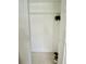 Empty closet with open hanging space and visible paint cans at 731 Wyman Ct # 731-A, Orlando, FL 32809