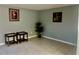 A simple living room with neutral walls, light tile floors, and minimal décor at 731 Wyman Ct # 731-A, Orlando, FL 32809