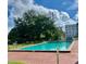 A beautiful community pool set among trees and green space at 731 Wyman Ct # 731-A, Orlando, FL 32809