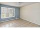 Bedroom with window and tiled floors at 784 Seneca Trl, St Cloud, FL 34772