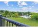 Enjoy picturesque lake views from this property's well-manicured backyard at 8550 Lost Cove Dr, Orlando, FL 32819