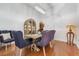 Traditional dining room with hardwood floors, and vintage furniture at 8550 Lost Cove Dr, Orlando, FL 32819