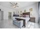 Bright main bedroom features tile floors and stained glass windows at 8550 Lost Cove Dr, Orlando, FL 32819