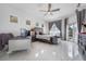 Bright main bedroom features tile floors, stained glass windows and an outdoor balcony at 8550 Lost Cove Dr, Orlando, FL 32819