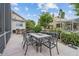 An outdoor patio boasts ample seating options for entertaining guests or enjoying leisure time at 8550 Lost Cove Dr, Orlando, FL 32819