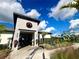Exterior of Retreat Club with festive holiday decorations, adjacent to water park attractions at 9122 Sommerset Hills Dr, Davenport, FL 33896